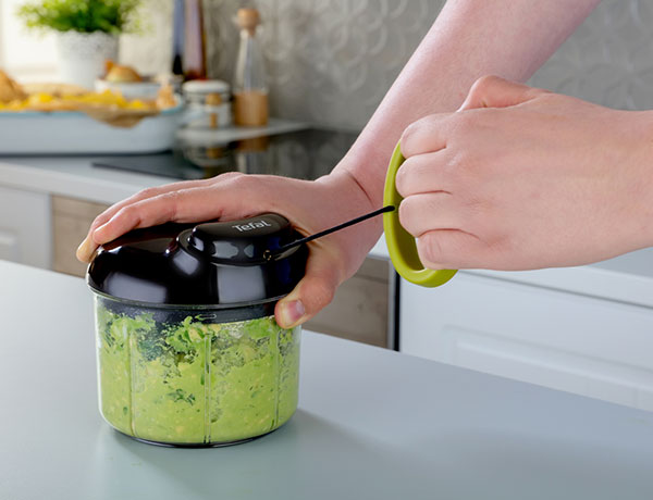 Manual chopper in use